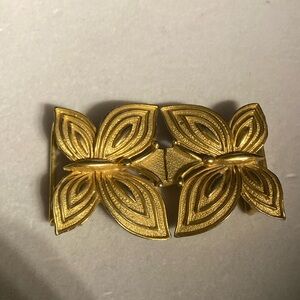 MIMI 1975 rare gold tone butterfly buckle . Highly collectible and wearable .